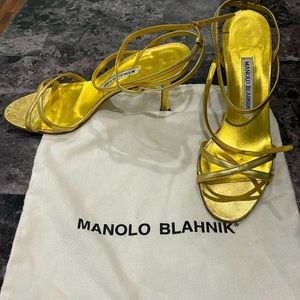 Manolo Blahnik, gold strap sandals.